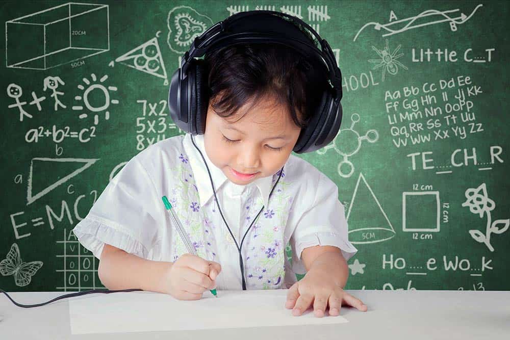learning disabilities, child listening to music through headphones