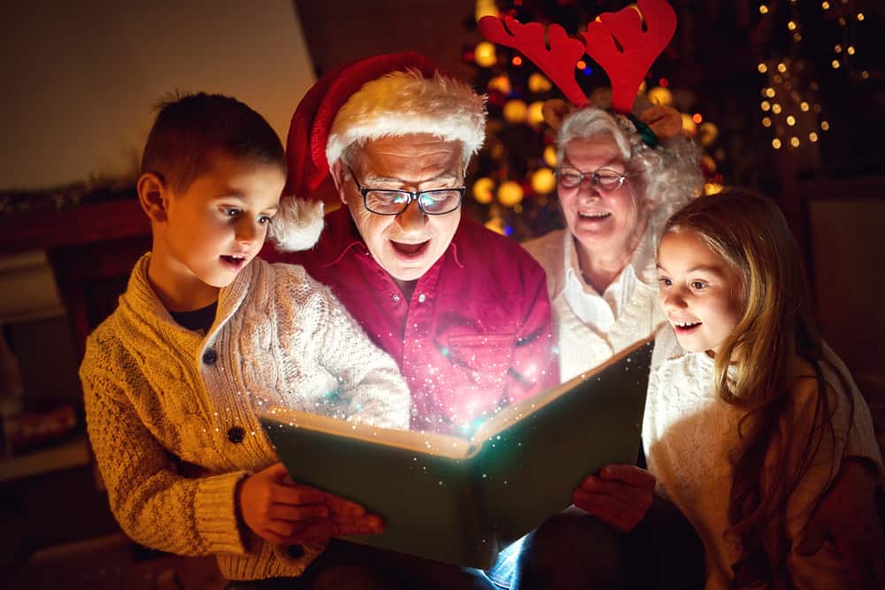 Christmas, photo album or memories with a grandmother and kids